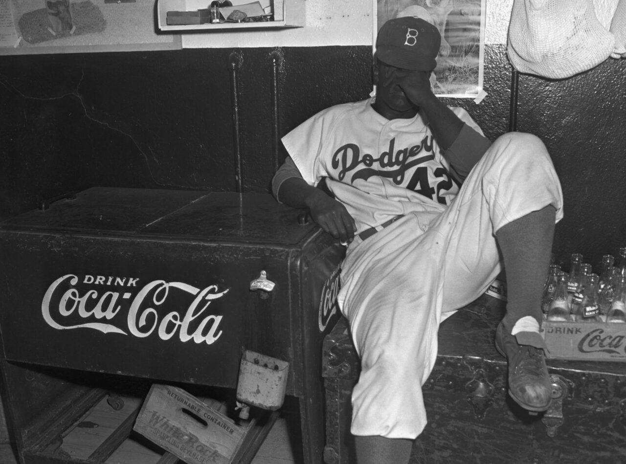 baseball great jackie robinson hiding his face