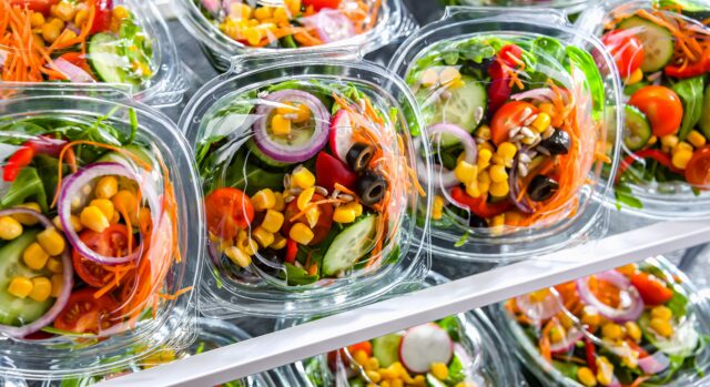 plastic,boxes,with,pre packaged,vegetable,salads,,put,up,for,sale