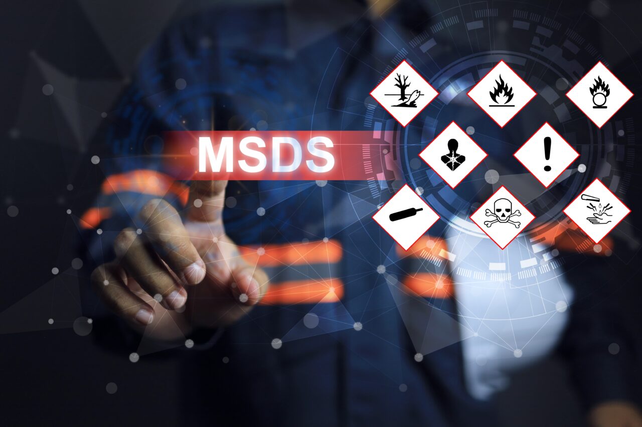 safety,staff,pointing,on,the,warning,sign,of,hazardous,substances