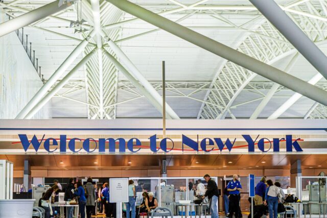 new york city,ny nyc brooklyn,john f. kennedy international airport,jfk,american airlines,welcome,sign,terminal,structure beam,homeland security,check
